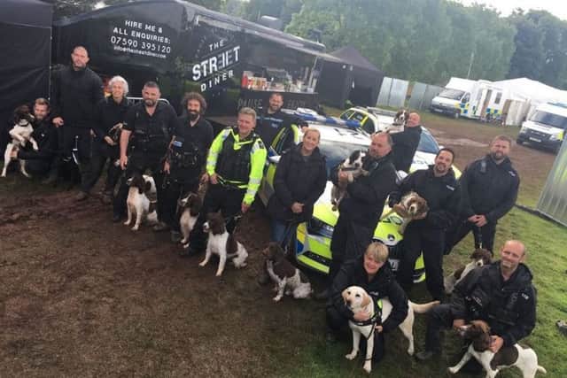 Cumbria Police dog handlers and their dogs at last year's Kendal Calling Festival.