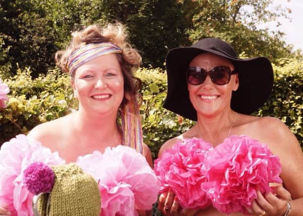 Toni Riddick, (right) who has been diagnosed with breast cancer has done a calendar similar to Calendar Girls to raise money for CancerCare.