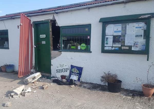 Damage to the shop front at Growing With Grace