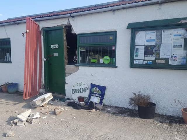 Damage to the shop front at Growing With Grace