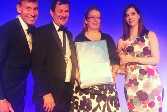Rose Rawcliffe receiving her award at the ceremony. From left: Dr David Bull, awards host; Tim Blowers, national chair of the Lead Association for Catering in Education; Rose Rawcliffe; Louise Hardcastle, category buyer for food at YPO, the award sponsors.