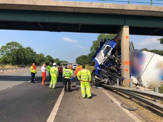 The lorry hit the motorway bridge near Broughton