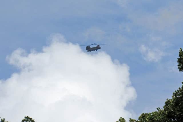 An RAF Chinook helicopter flies over St John's Hospice, Lancaster, especially for patient Bob Pickles of Morecambe.