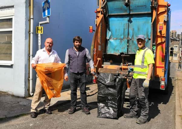 From left:  John ONeill, Manager, Morecambe BID, Tony Vettesse, The Old Pier Book Shop, Marine Road, Morecambe and Frank Smith, LCC waste operative.