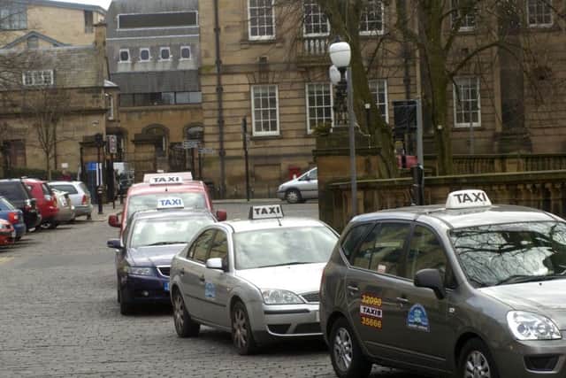 Stock image of taxis in Dalton Square.
