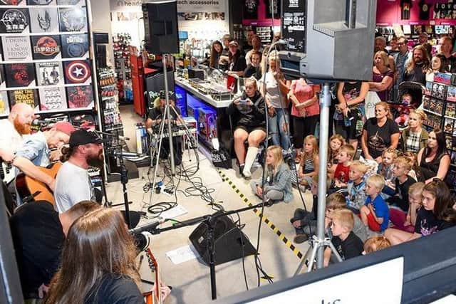Massive Wagons perform at Lancaster HMV. Photo from HMV Facebook by Shirlaine Forrest