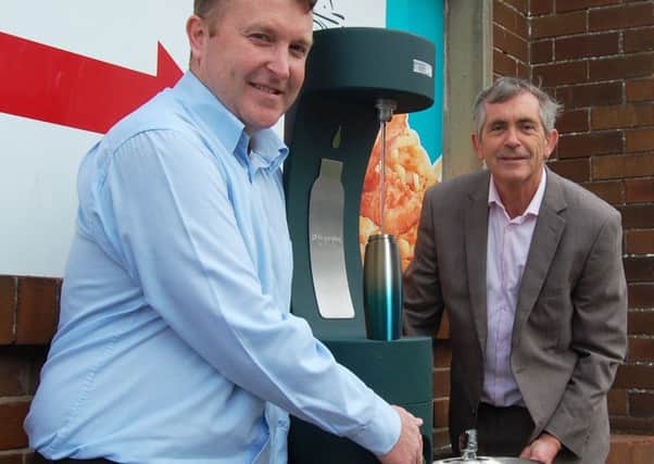 Councillors Brendan Hughes and Andrew Kay with the new water fountain at the Clock Tower in Morecambe.