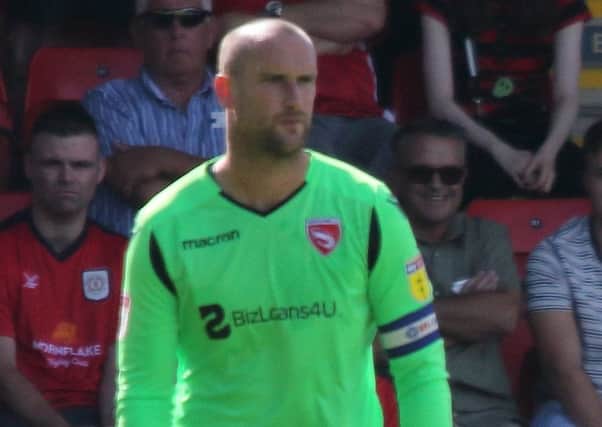 Morecambe keeper Barry Roche