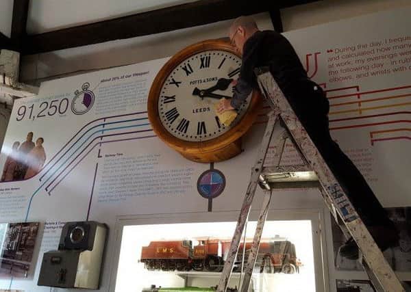 Curator of Industrial History John McGoldrick with the Potts Clock, which has just gone on display at Leeds Industrial Museum.
