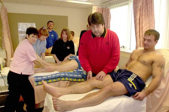 Dave Edge and Lancaster and Morecambe College Advanced Diploma in Sports Therapy students working on Russian Rugby League players.