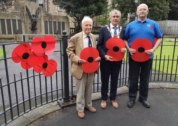 Raymond Hirst (left) and Andrew Taylor (right, branch officers of the Lancaster Royal British Legion) with the Mayor of Lancaster, Coun Andrew Kay.