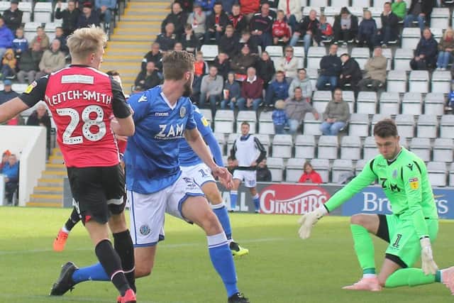 A-Jay Leitch-Smith scores Morecambe's opening goal against Macclesfield Town last weekend