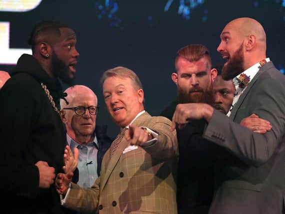 Tyson Fury and Deontay Wilder square off at Monday's press conference