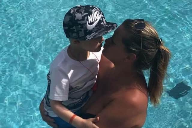 Charlie on holiday in Greece last week with mum Amber.