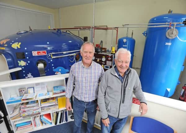 Hyperbaric Oxygen Centre at A Breath for Life in Morecambe.  Pictured is unit manager Dave Holehouse with trustee and volunteer George Birkett.