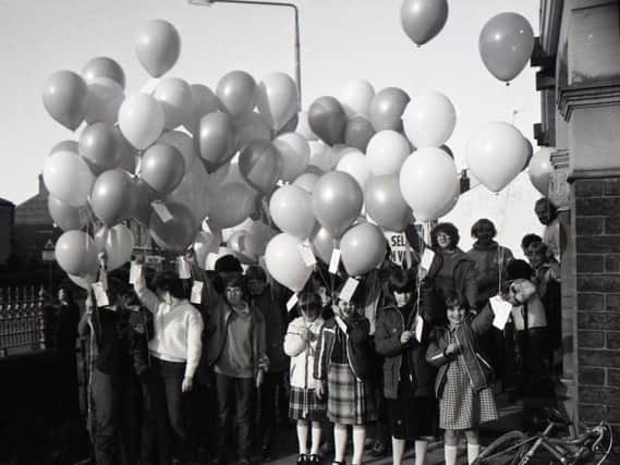 Up and away... and a big sigh of relief from youth club officials as more than 100 gaily coloured balloons took off from Bamber Bridge Methodist Church. The club with the furthest-travelling balloon wins a cash prize