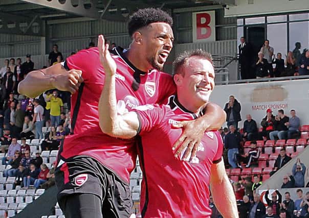 Morecambe's Garry Thompson managed 76 minutes on his return from injury