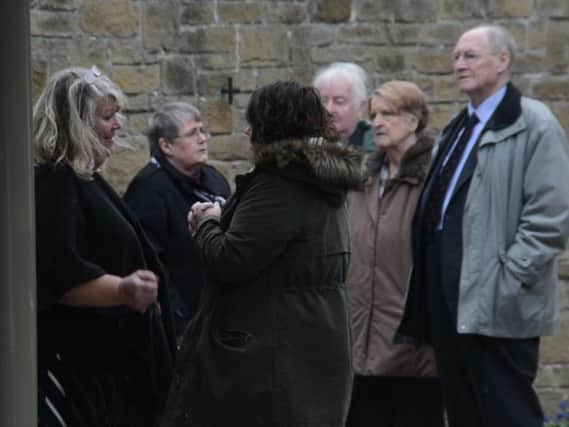 Mourners pay their respects at Evelyn Archer's funeral