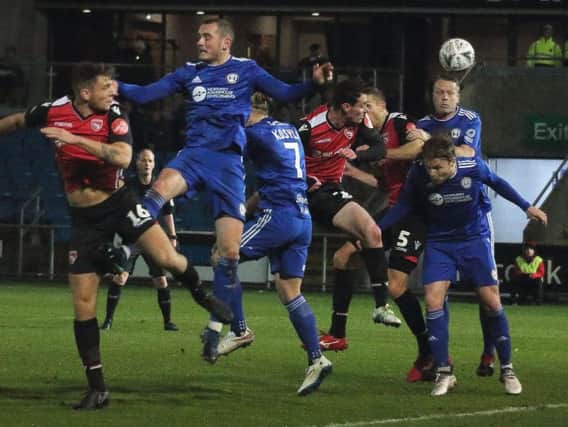 Morecambe bowed out of the FA Cup at Halifax on Tuesday night
