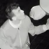 An image taken from the CCTV at Denver Peel's home which caught the vandalism taking place.