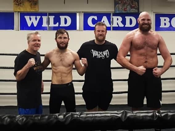 Isaac Lowe, second left, with Freddie Roach, Ben Davison and Tyson Fury