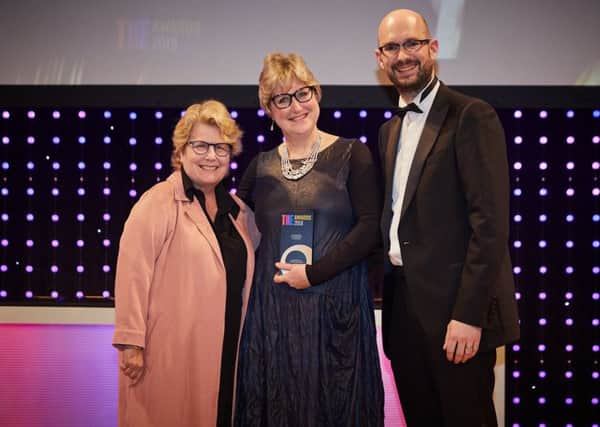 UCLan's joint institional lead Liz Bromley receiving the International Collaboration of the Year award from Sandi Toksvig.