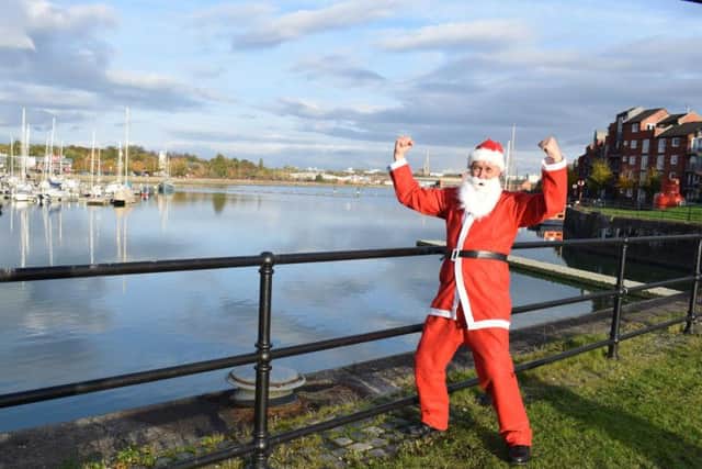 St Catherine's Santa Dash has moved to Preston Docks this year