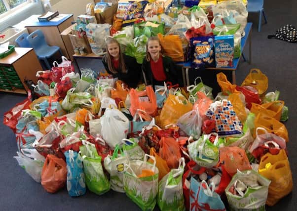 Jasmine ? and Erin ? organised a non-uniform day to raise awareness and collect donations for the local foodbank.
