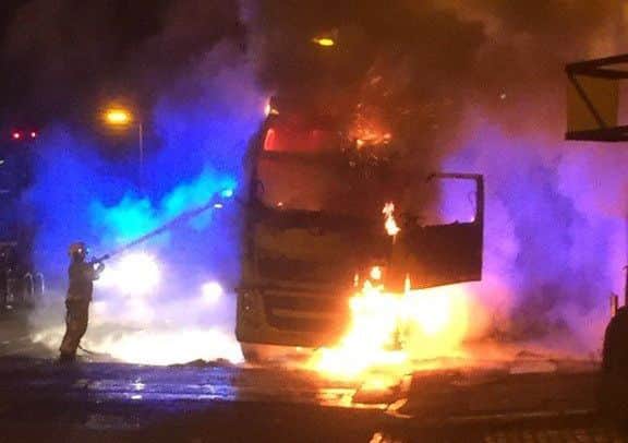 Flames engulfed Mike Healy's cab, but his life was saved by fellow trucker Steve Belmont from Morecambe.