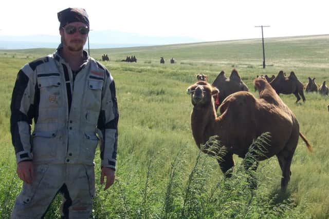 Kurtis Murphy with a Mongolian camel.