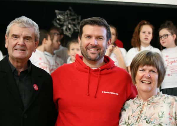 Dave with his mum and dad Catherine and Stephen McPartlin.