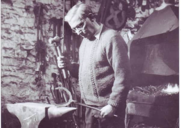 Robert Taylor blacksmith, making a horseshoe at Green Smithy, Mewith, near Bentham, in 1933. Robert is wearing leather gaiters to prevent hot iron sparks going down his boot tops.