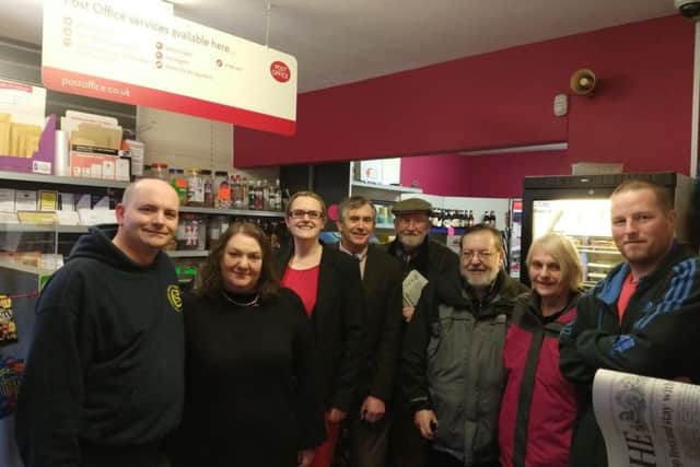 Paul Batchelor and partner Helen Jones with County Coun Lizzie Collinge, mayor Andrew Kay and customers at the official opening of the new Post Officer counter in The Corner Shop at 2 Ullswater Road.
