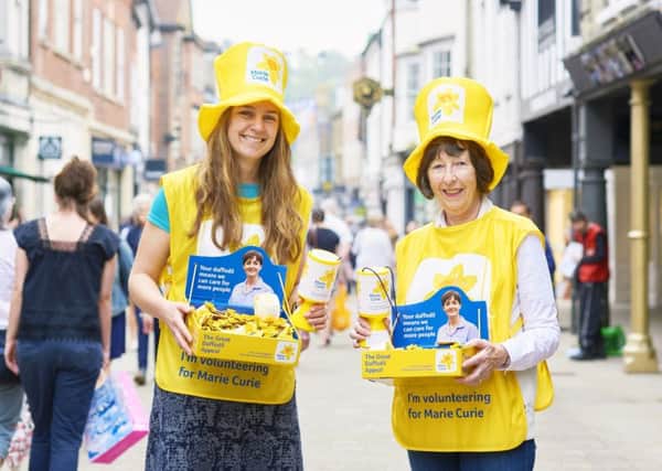Volunteers collecting for the Great Daffodil Appeal 2018 in Winchester.

This picture was taken in April 2018.