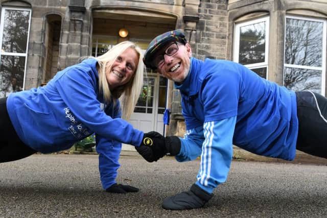 Photo Neil Cross
Steve Cody is doing the "cha cha slide plank" every day in 2019 to raise money for Cancercare, pictured with his sister Andrea Partridge