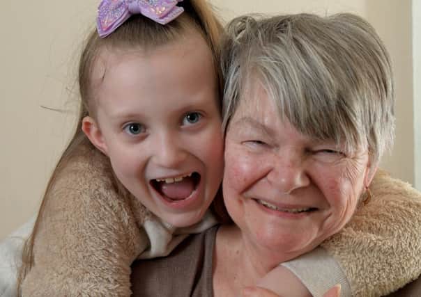 Photo Neil Cross Eight-year-old Payton Moorby and her nana Linda - Payton raised £20 for Rosemere from the tooth fairy to help as her nana has breast cancer