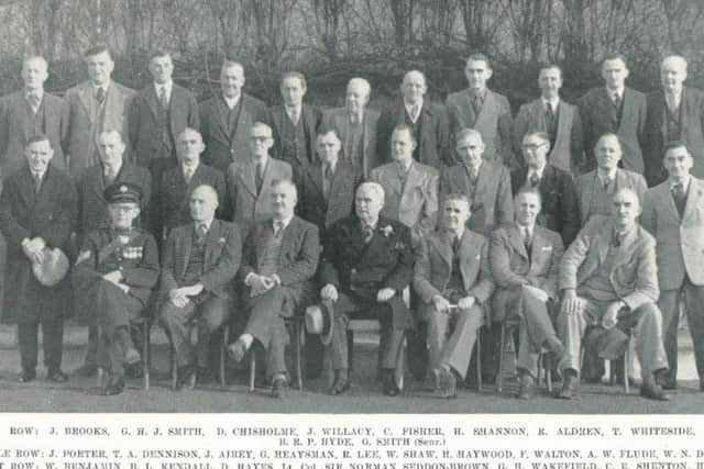 This photograph was taken in 1949 and shows the Lansil employees who had served the company faithfully for 21 years from 1928 with Lt. Col. Sir Norman Seddon-Brown seated centre of the front row.