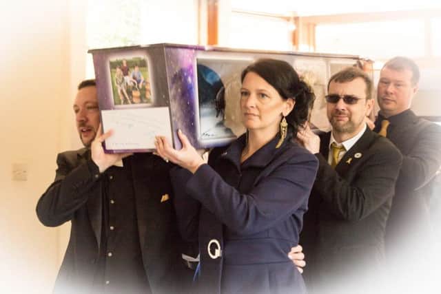 Reece's coffin is carried into the chapel. Pictured are pallbearers Stuart O'Neil, Rachel O'Neil, Martin O'Neil and Lewis Macfarlane. Photo by Mike Jackson.
