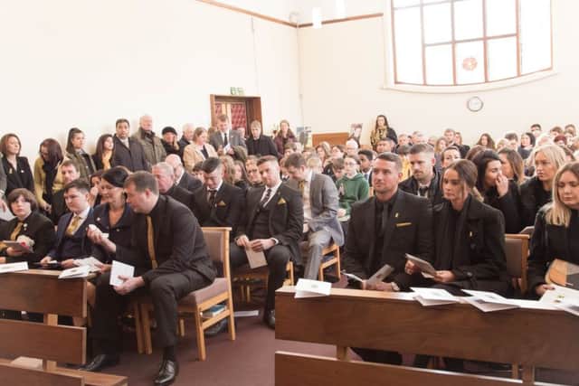 Reece's family and friends inside the chapel at Lancaster & Morecambe Crematorium. Photo by Mike Jackson.
