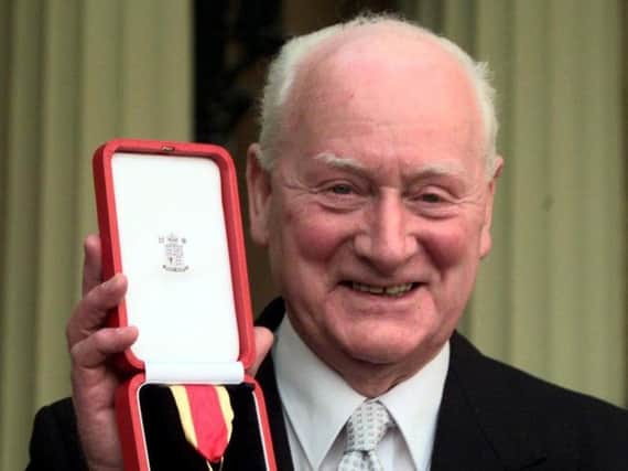 Sir Tom Finney with his knighthood