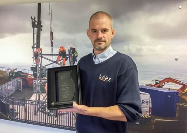 LARS MD Ian Turner with a Met Office award.