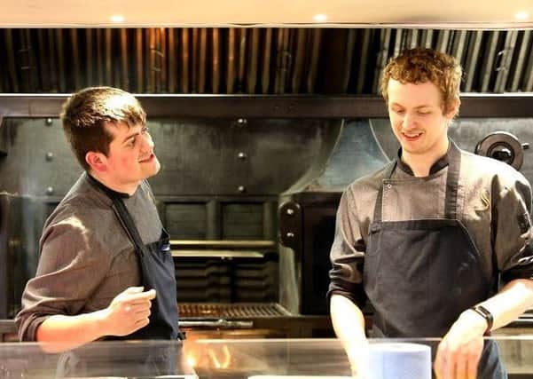 Culinary Academy Matt Lemm (left) hard at work in the kitchen with Ashley Brannigan.jpg