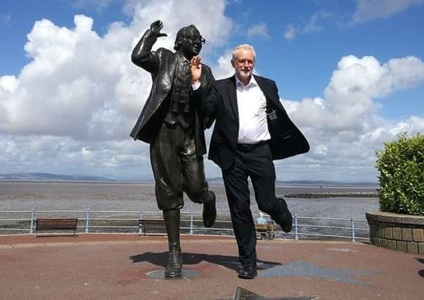 Jeremy Corbyn at the Eric Morecambe statue during a previous visit to Morecambe. Photo by Alan Gregson