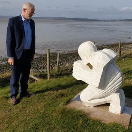 Jeremy Corbyn at the Praying Shell sculpture.
