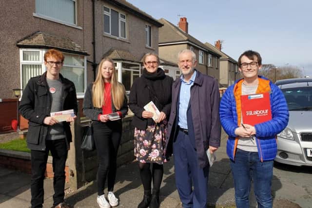 Jeremy Corbyn with Lizzi Collinge and Labour members during their walkabout on Saturday.