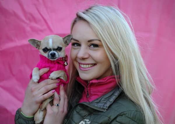 Cancer Care's Bark in the Park event took place for the first time in Happy Mount Park in Morecambe. The event featured dog shows, agility course plus fancy dress, stalls and treasure hunt and attracted a bumper crowd of dog lovers. Helen Barski with her Tea Cup Chihuahua, Peaches. Picture by Paul Heyes, Sunday March 24, 2019.