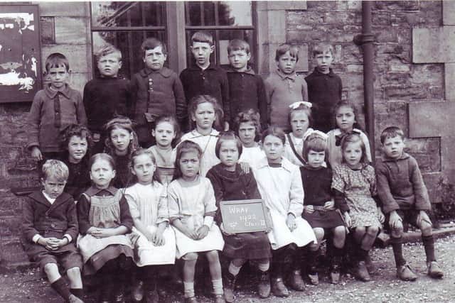 Wray School pupils, Class Two, 1922. Back row (from left) Bob Wilson, George Robinson, John Atkinson, unknown, unknown, unknown, Mary Holroyd, Mary Askew. Front row (from left) Jim Kenyon, Sarah Kitchen, Jane Hodgson, Annie Smith, Lucy Constantine, Olive Taylor, Jessie Marie Dixon, Mary Bevins, John Clarkson.