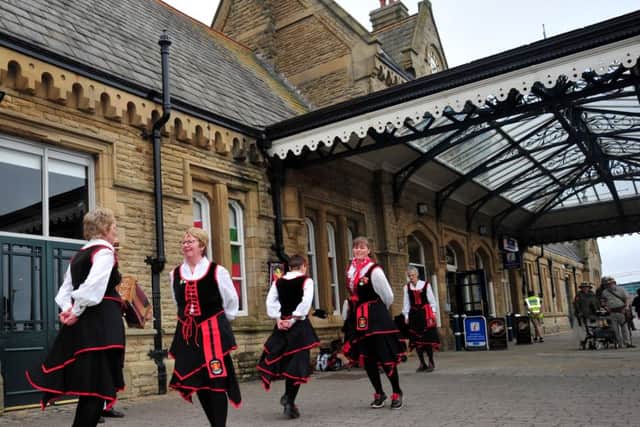 Carlisle Clog and Sword Dancers perform outside the Platform for the Splendid Day Out festival in Morecambe