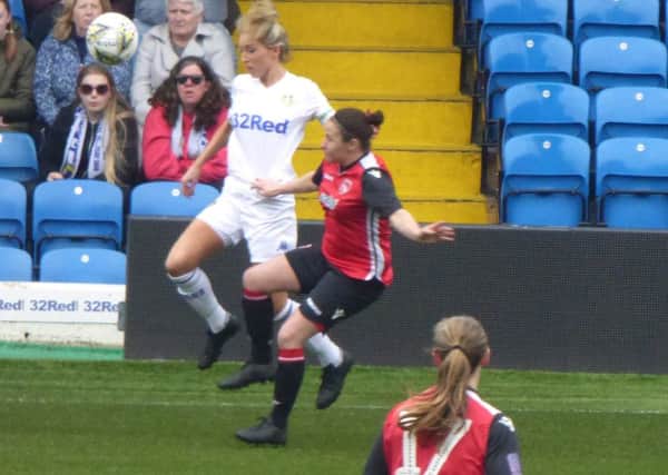 Megan Doherty goes in for a challenge against Leeds Ladies.