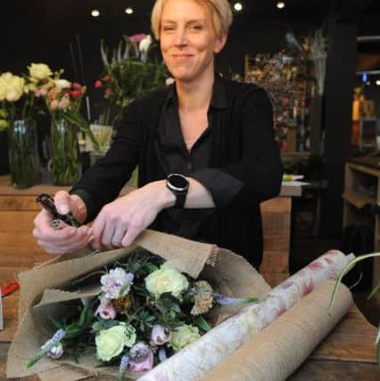 Time for Flowers in Heysham have started using biodegradable and eco friendly wraps for their flowers.  Pictured is florist Catherine Curran.